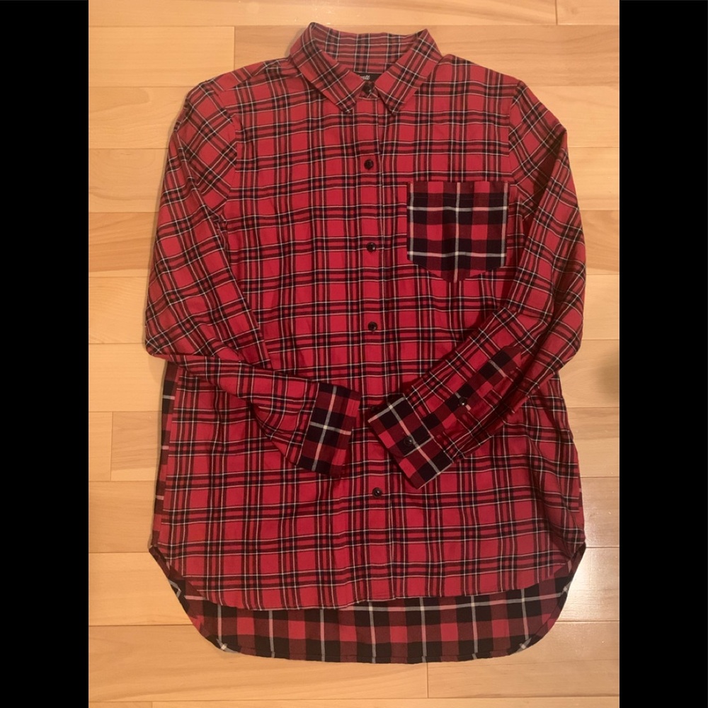 Red plaid with button shirt. Sweet peak-a-boo back. Dress up and go casual